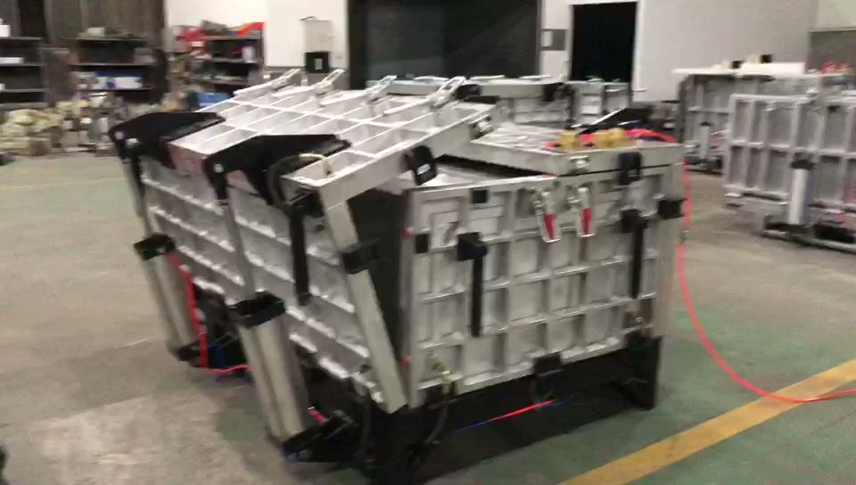 Our workshop: refrigerator foaming moulds on wheeled bases, cylinder-driven
